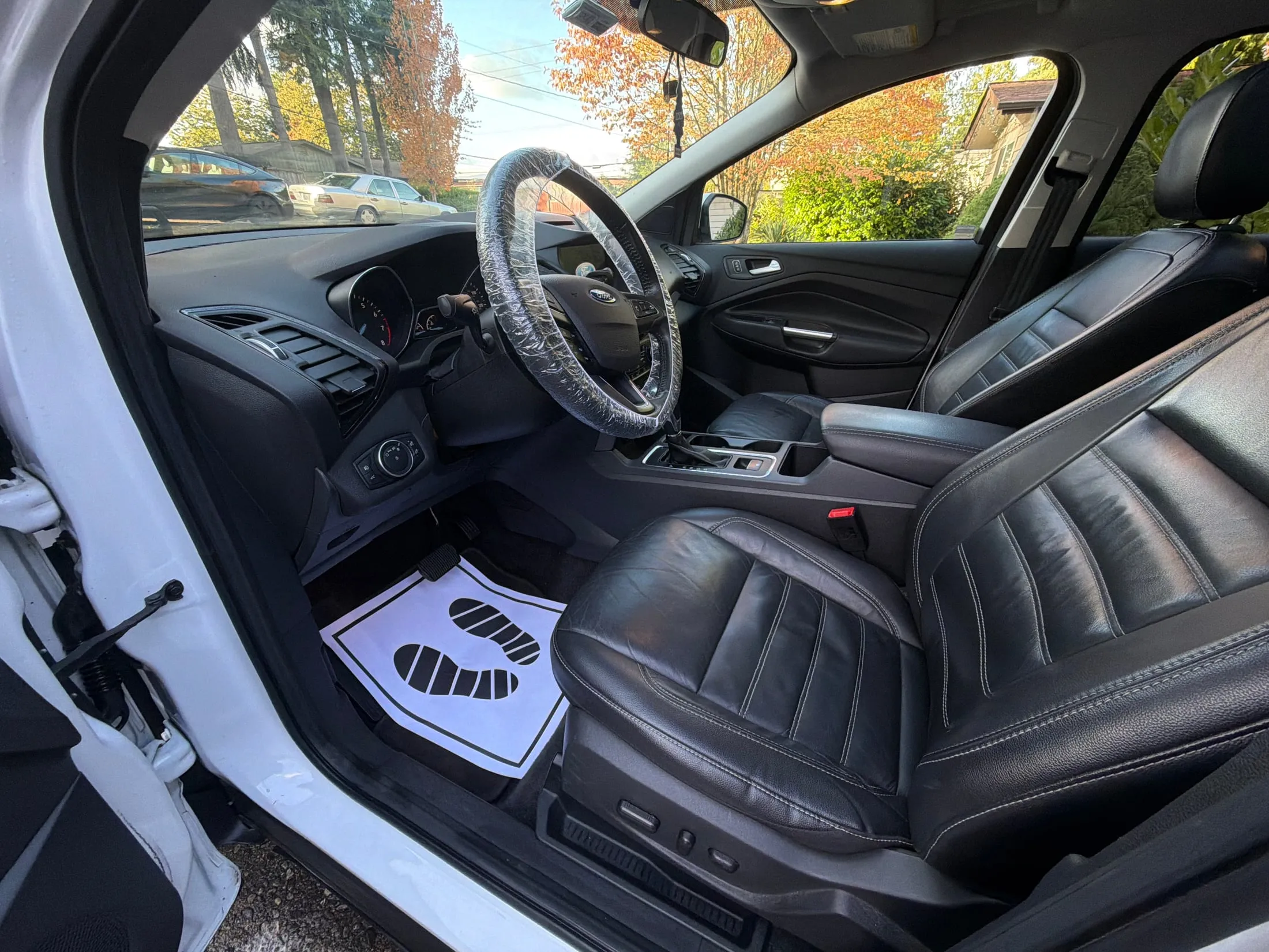 Clean leather front seats of an SUV