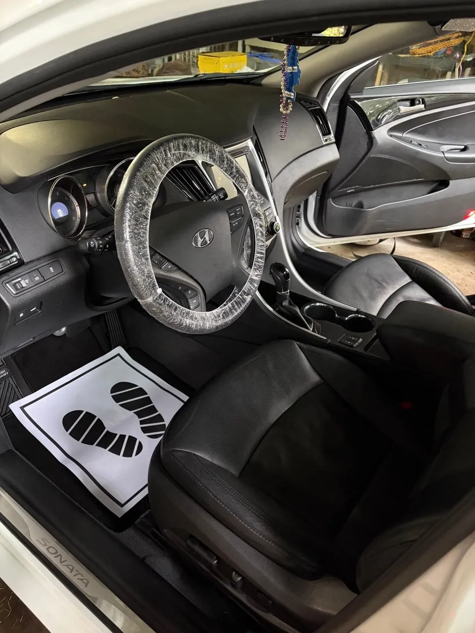 Leather front seats and dashboard after an interior detail
